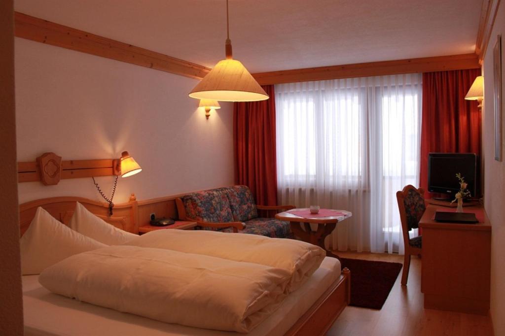 Hotel Camona & Apart Walserhof Samnaun Pokoj fotografie